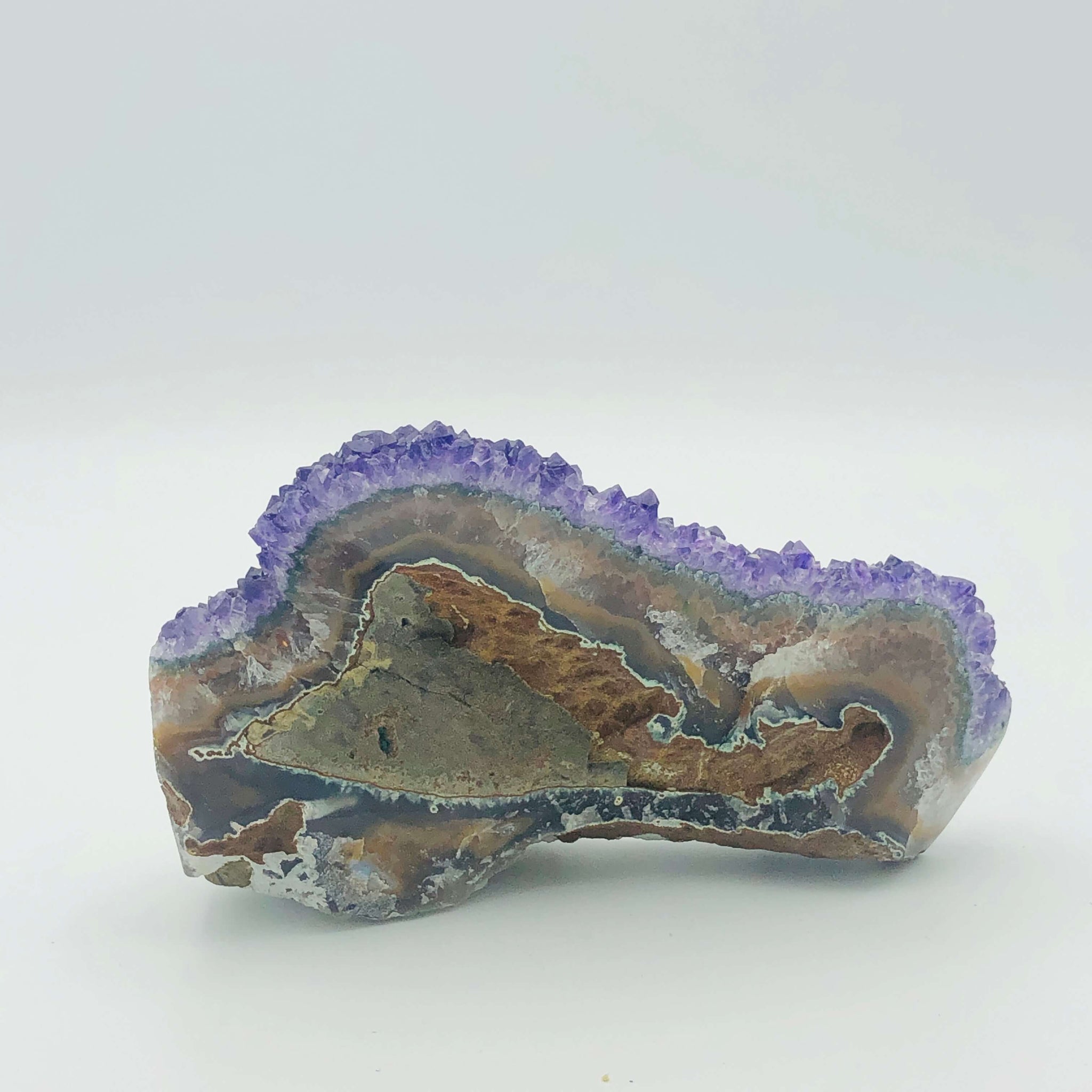Amethyst and calcite with polished agate edge